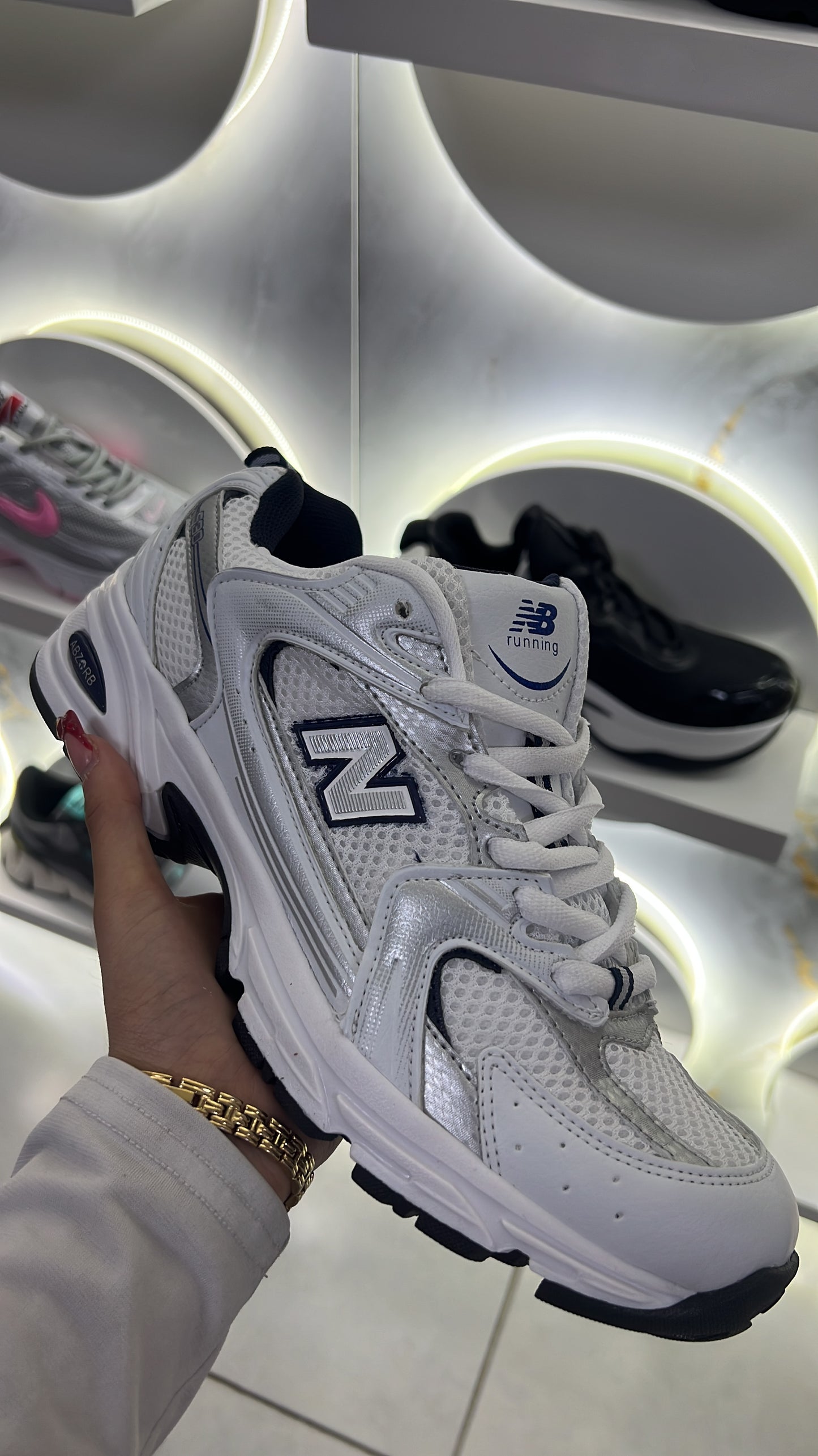 NEW BALANCE GRIS CON AZUL DUPE