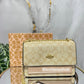 BOLSO COACH BEIGE IMPORTADO