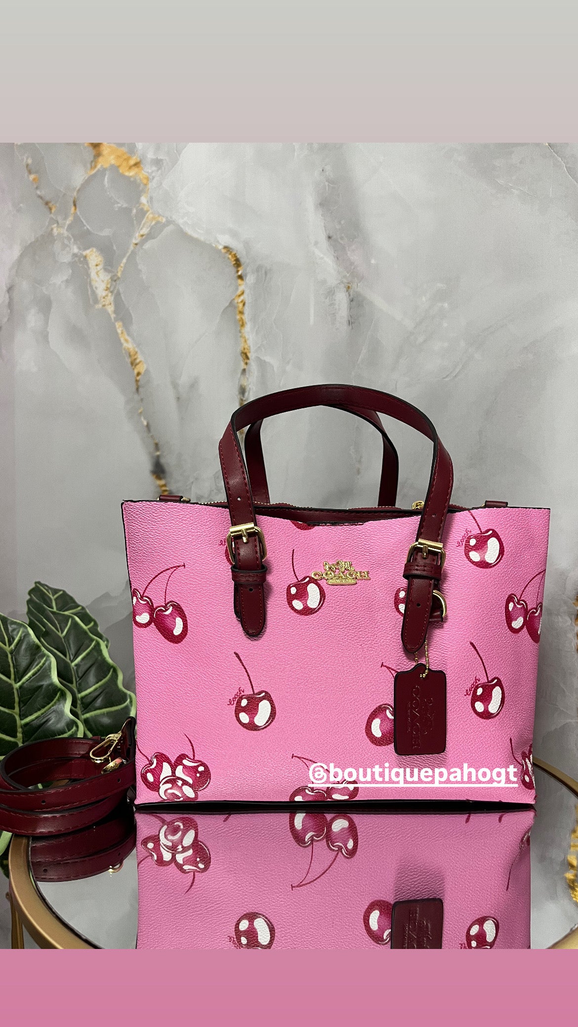 BOLSO COACH DE CEREZA