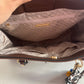 BOLSO STEVE MADDEN CAFÉ CON COLGANTES DE DADOS ORIGINAL
