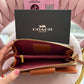 BILLETERA COACH BEIGE