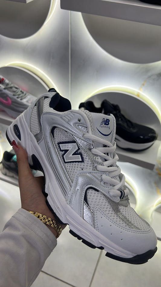 NEW BALANCE GRIS CON AZUL DUPE