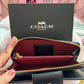 BILLETERA COACH NEGRA LISO