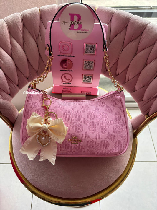 BOLSO COACH MEDIA LUNA ROSA CON MOÑO BLANCO