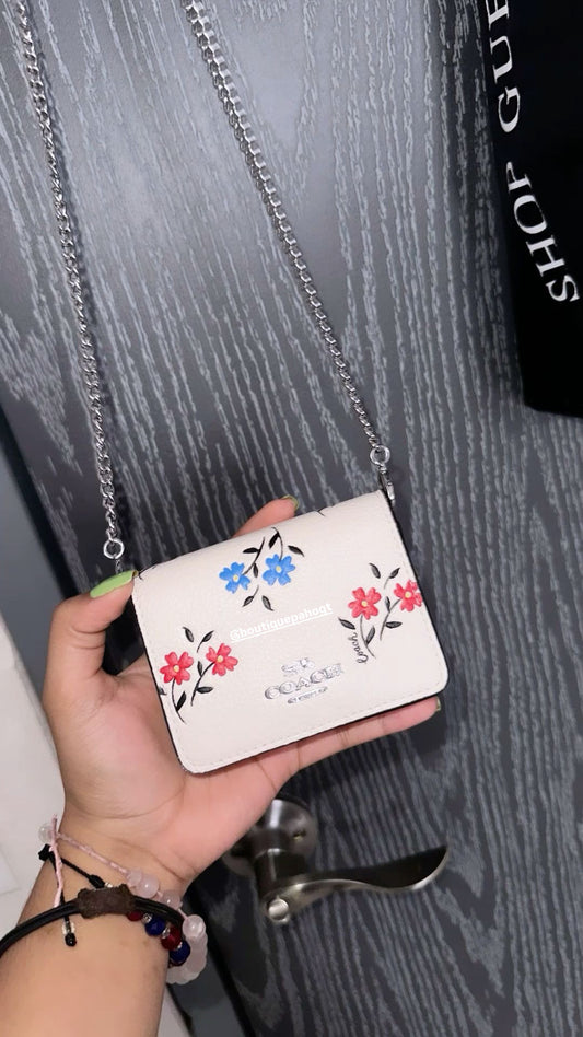 MINI BOLSO COACH BLANCO CON FLORES