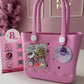 BOLSO HOT FOCUS CON PERFORACIONES Y DIJES DECORATIVOS MEDIANA ORIGINAL