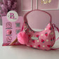 BOLSO MEDIA LUNA ROSA CON FRESAS JESSICA SIMPSON ORIGINAL