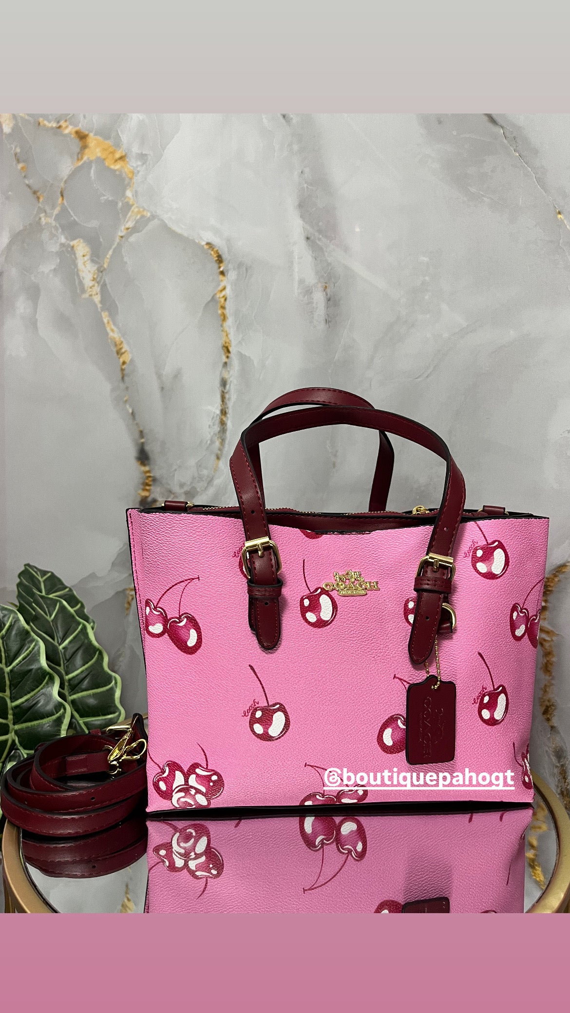 BOLSO COACH DE CEREZA