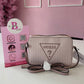 BOLSO CROSSBODY GUESS ROSA CON SÍMBOLO ? ORIGINAL