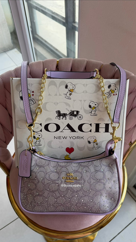 BOLSO MEDIA LUNA TERI LILA COACH DUPE