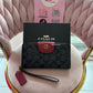 BILLETERA COACH NEGRA CON CORINTO