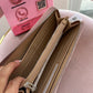 BILLETERA CON CIERRE GUESS ROSA