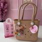 BOLSO HOT FOCUS CON PERFORACIONES Y DIJES DECORATIVOS MEDIANA CAFE ORIGINAL