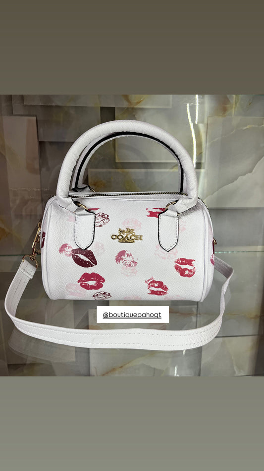 BOLSO COACH DE BESOS IMPORTADA